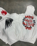 Black hooded sweatshirt with printed skull pattern and rhinestone detailing, cardigan style with loose fit