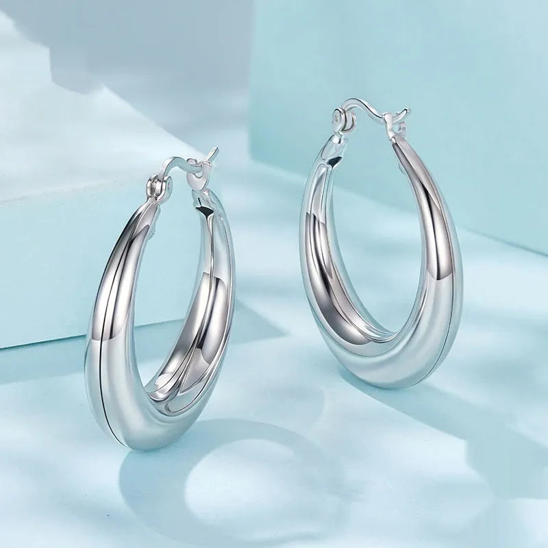 Copper geometric ring ear clip earrings with silver electroplated finish