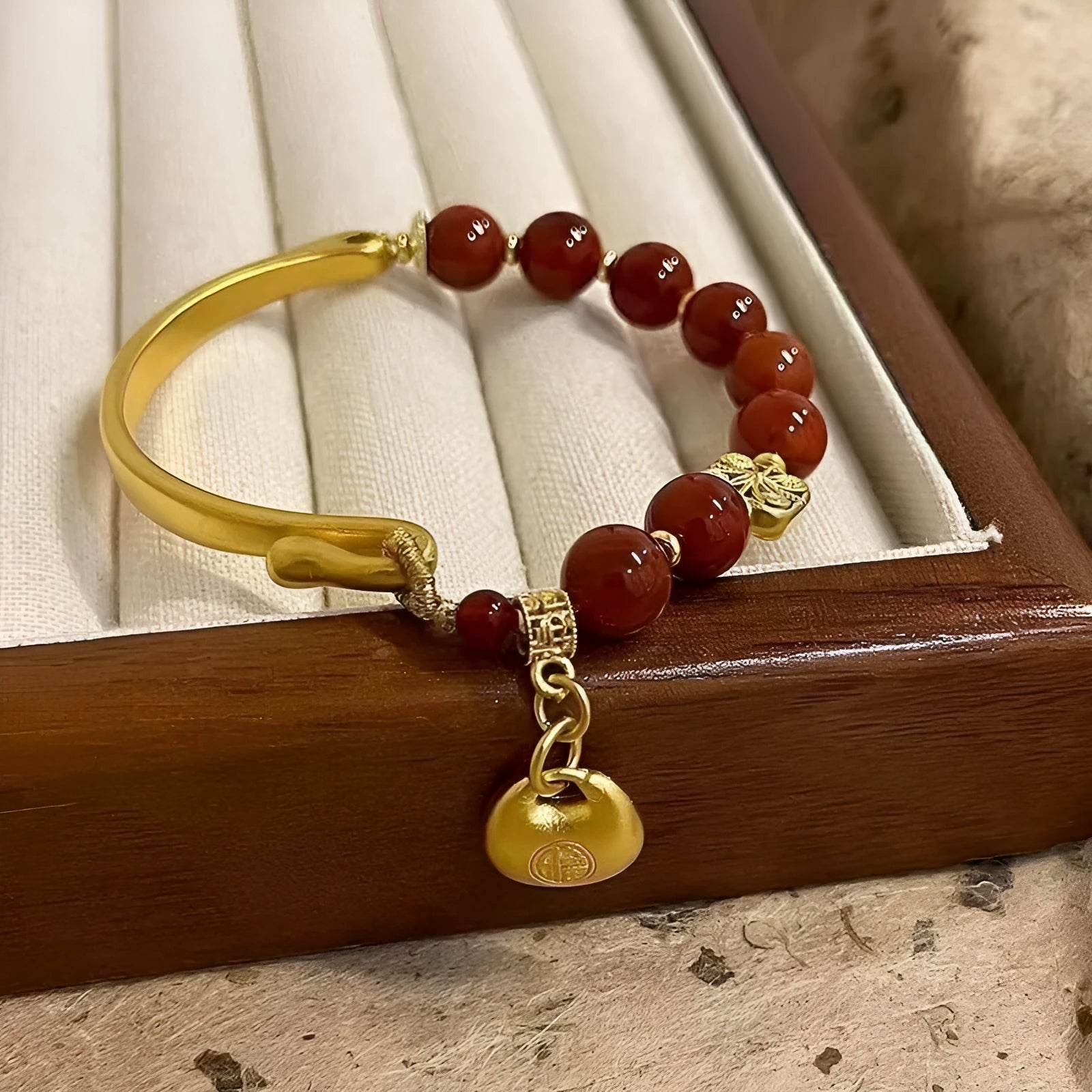 Golden South Red agate lucky bag bracelet with character ingot design for women