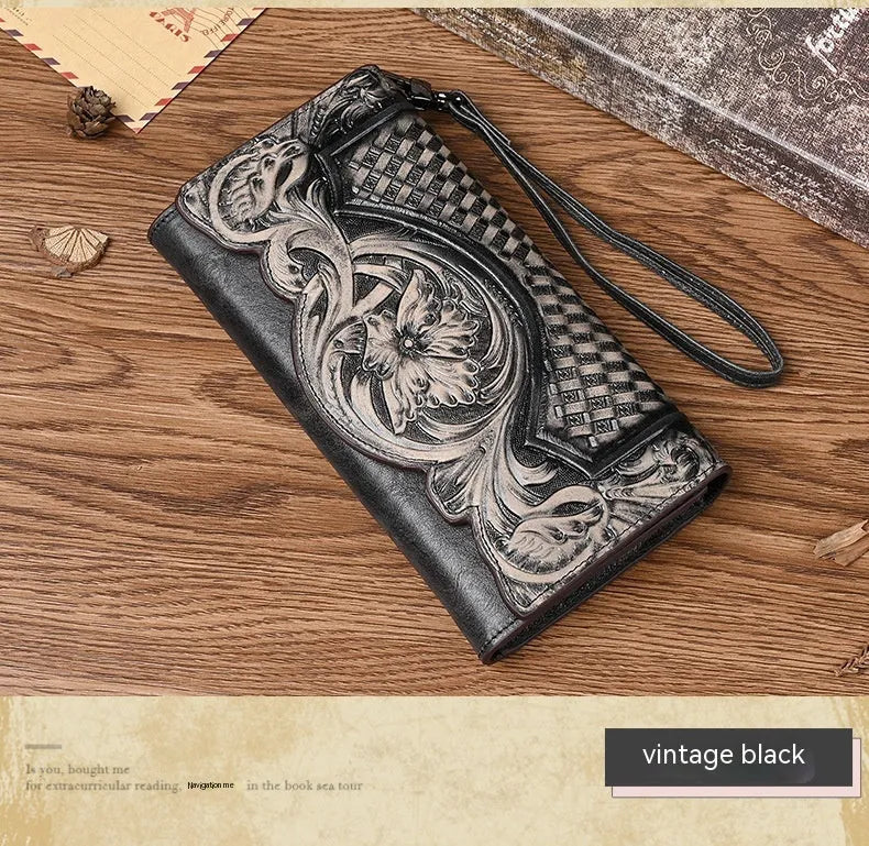 Retro brown women's tri-fold wallet with embossed floral pattern, showing interior card slots and coin compartment.