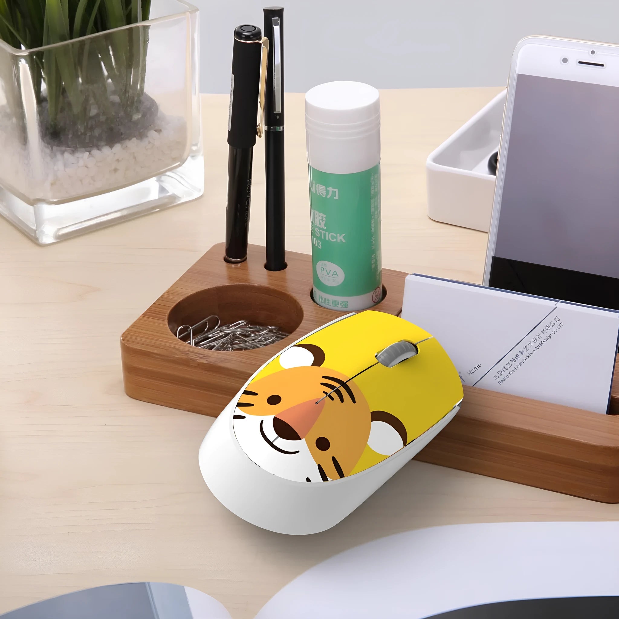 Colourful wireless mouse with animal designs including blue rabbit and green bear for laptop use