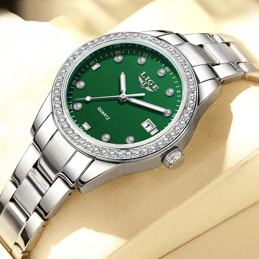 Silver Fashion Girl watch with round diamond-encrusted dial on stainless steel strap, showing luminous hands.