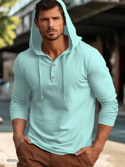 A dark blue cotton pullover hoodie with long sleeves on a hanger.
