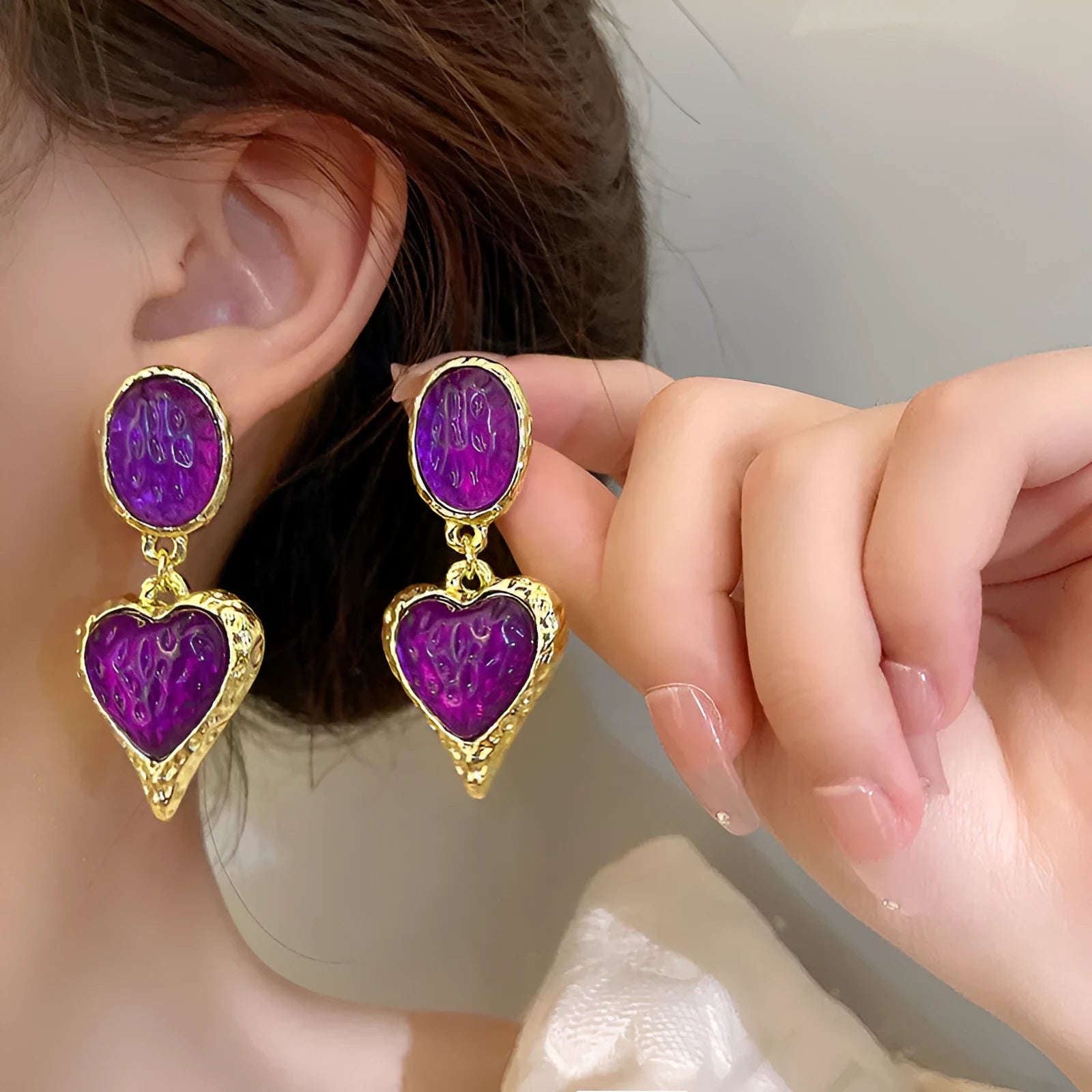 Silver pleated oval love heart stud earrings in purple, red, green, and yellow white colours.
