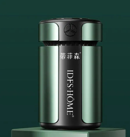 Three-speed adjustable smart rhythm car aroma diffuser in dark green, ABS aluminium alloy, with two essential oil bottles