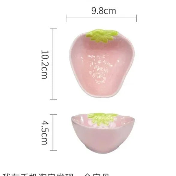 Strawberry-themed porcelain dinnerware set with plates, flower bowls, and microwave-safe spoons