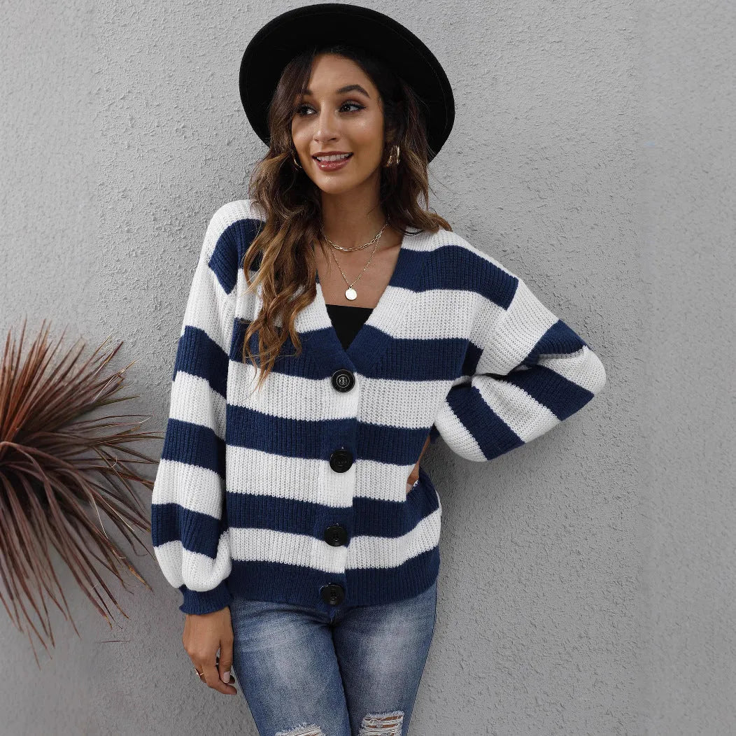 Blue striped women's cardigan with button front and regular sleeves made from deer plush fabric.
