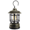 Portable camping lantern in black, red or dark green with dimensions 16.6cm x 6.7cm x 9.6cm