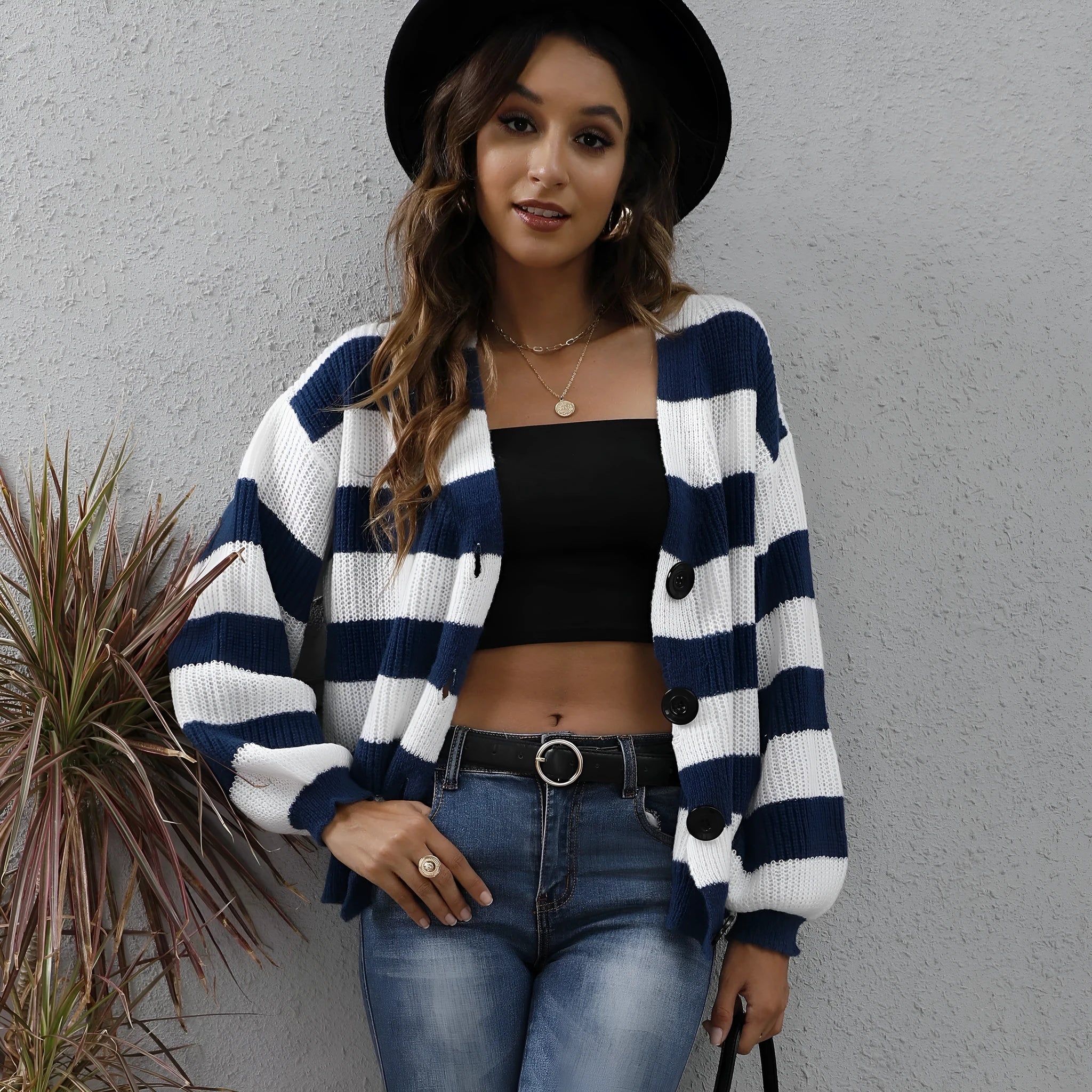Blue striped women's cardigan with button front and regular sleeves made from deer plush fabric.