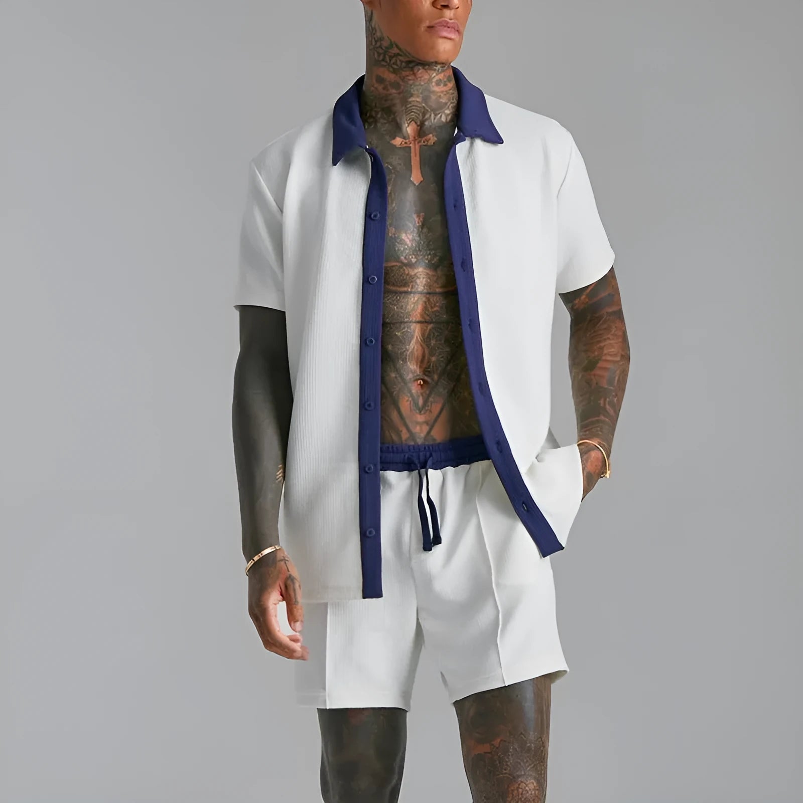 Men's two-piece suit in polyester cloth with printed design, available in black or white