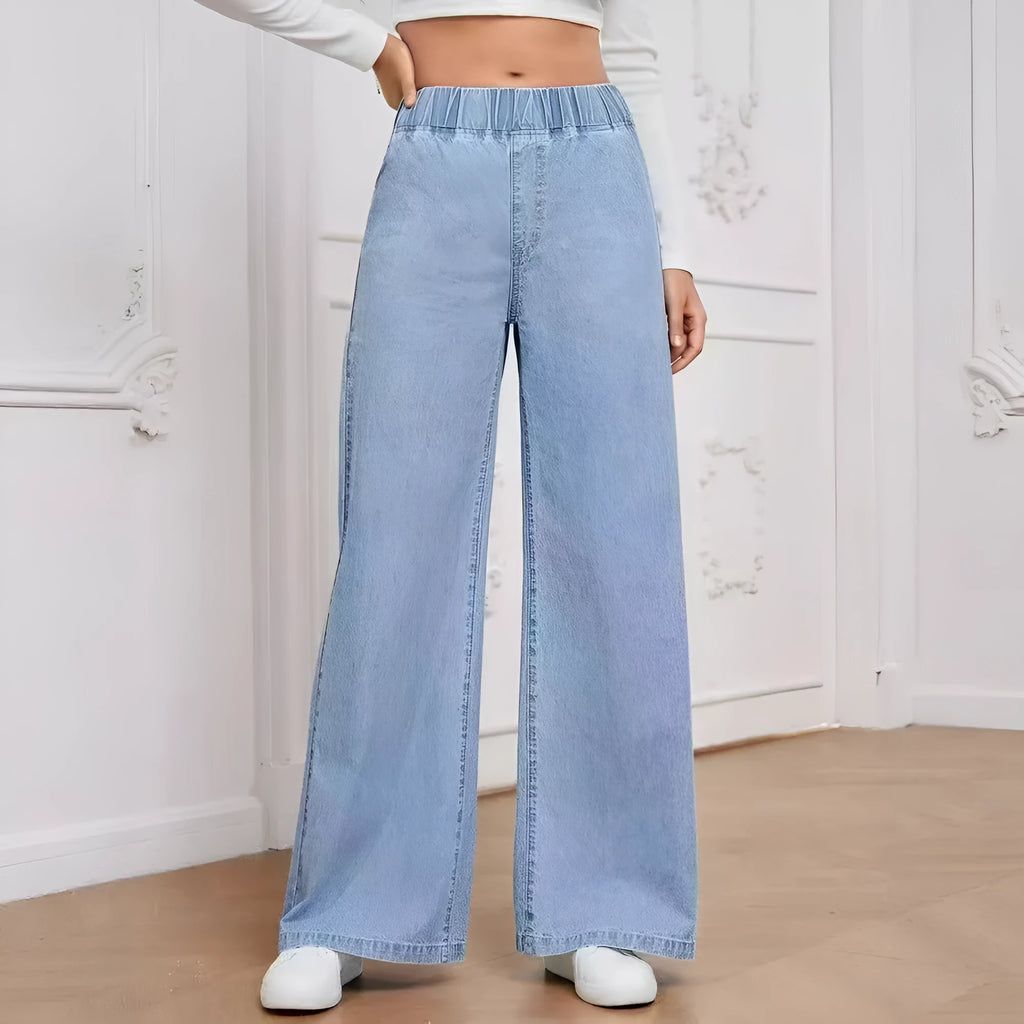 Light blue washed wide-leg straight denim trousers on a hanger, showing mid waist and zip fly.
