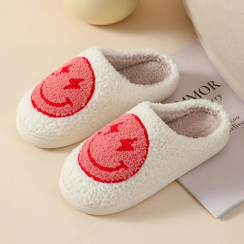 Women's plush home slipper with cartoon graphic print and non-slip PVC sole.