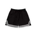 Man wearing loose fit grey polyester sports shorts for summer leisure.