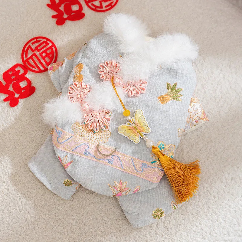 Red embroidered Tang suit for small dog with faux fur trim and tassels