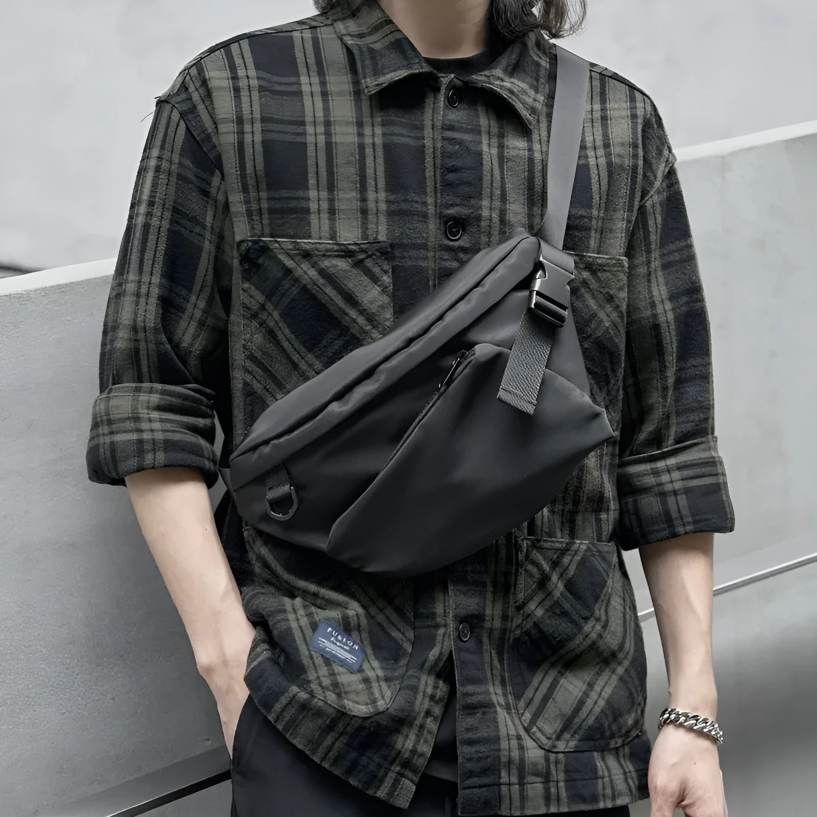 Black men's slanted chest bag with visible sewing line details