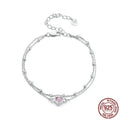 Women's sweet style sterling silver bracelet with small heart pendant on an adjustable chain.