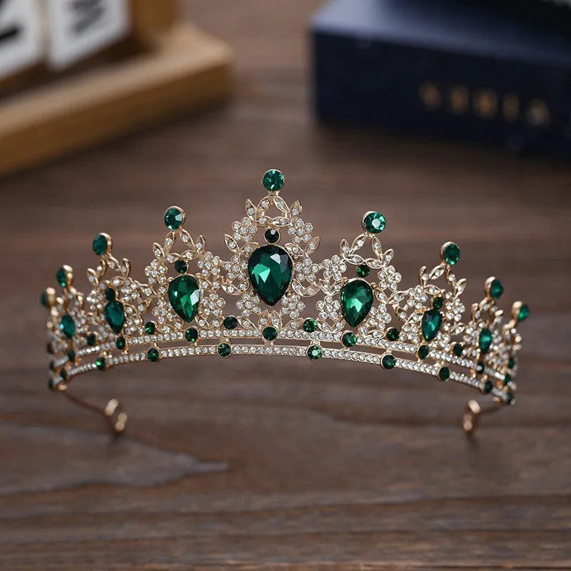Gold alloy crown-shaped wedding hair headdress with electroplated finish on neutral background