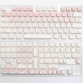 Full set of PBT sublimation keycaps for mechanical keyboards showing vibrant colours and 98+ key coverage