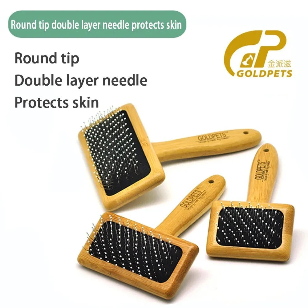 Goldpets bamboo slicker brush with wooden handle and 304 stainless steel pins on a light background