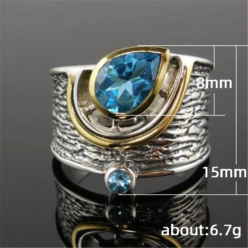 Blue Chinese-style alloy women's ring with inlaid zircon rhinestones in a drop shape.