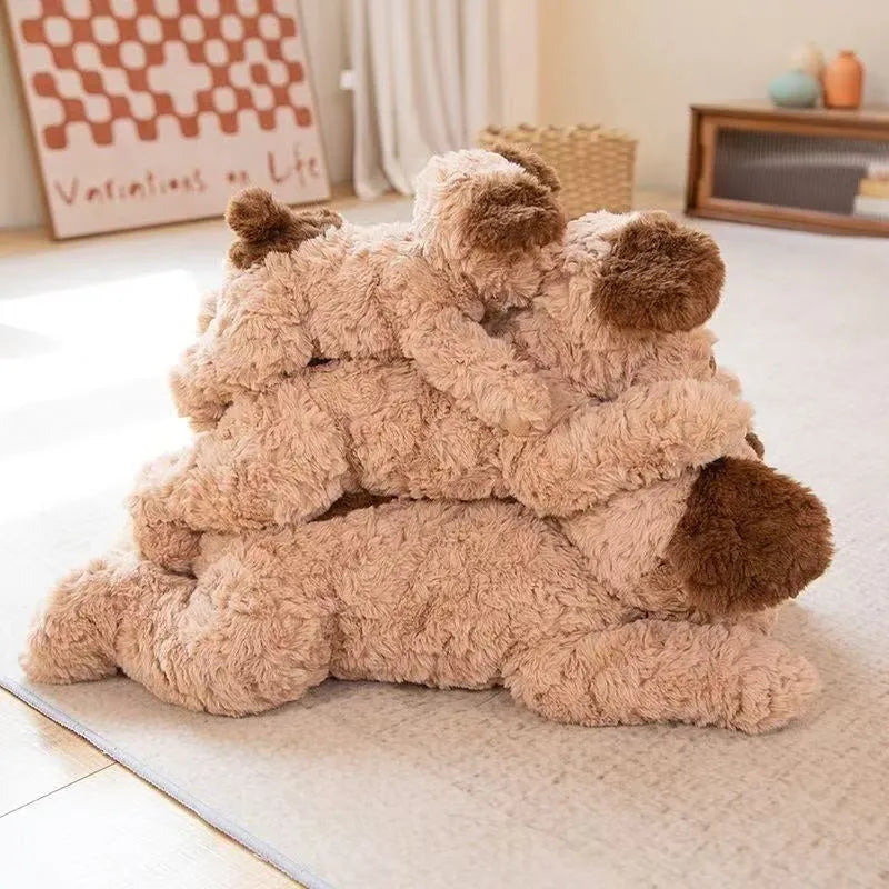 Lying dog plush toy in brown, white, and white and black, available in 35cm, 45cm, and 55cm heights.