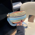 Women's woven straw beach bag in bohemian style with shell shape and single shoulder strap