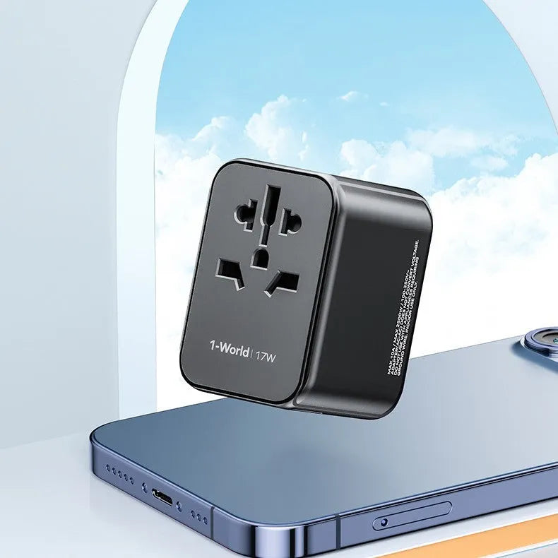 Black universal travel adapter UA12 with four-bit multi country converter, 70x64x48mm PC housing