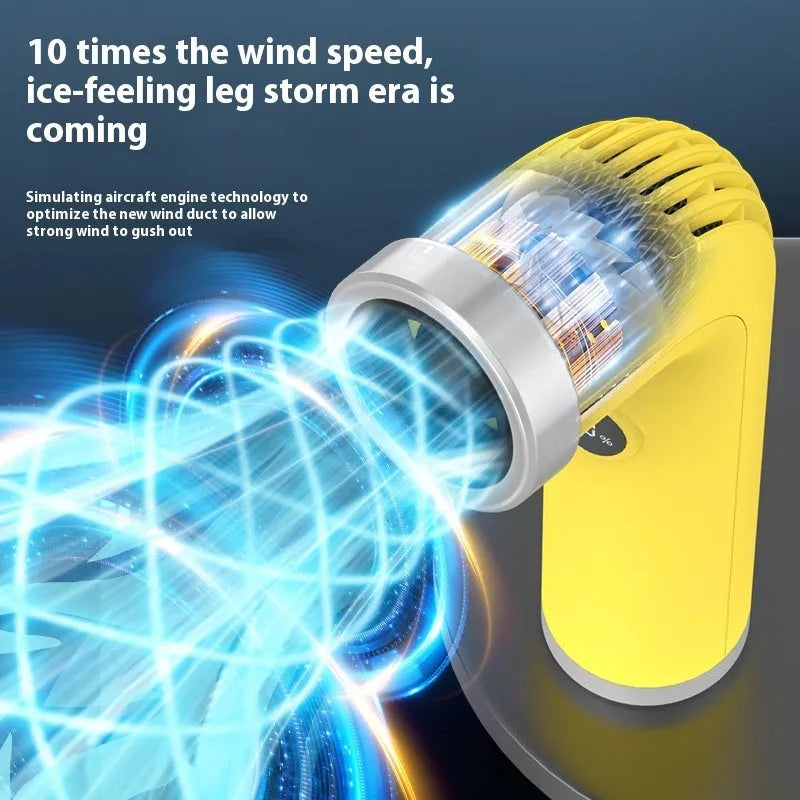 Compact apricot-coloured bladeless personal desk fan with smooth rounded housing and no visible blades.
