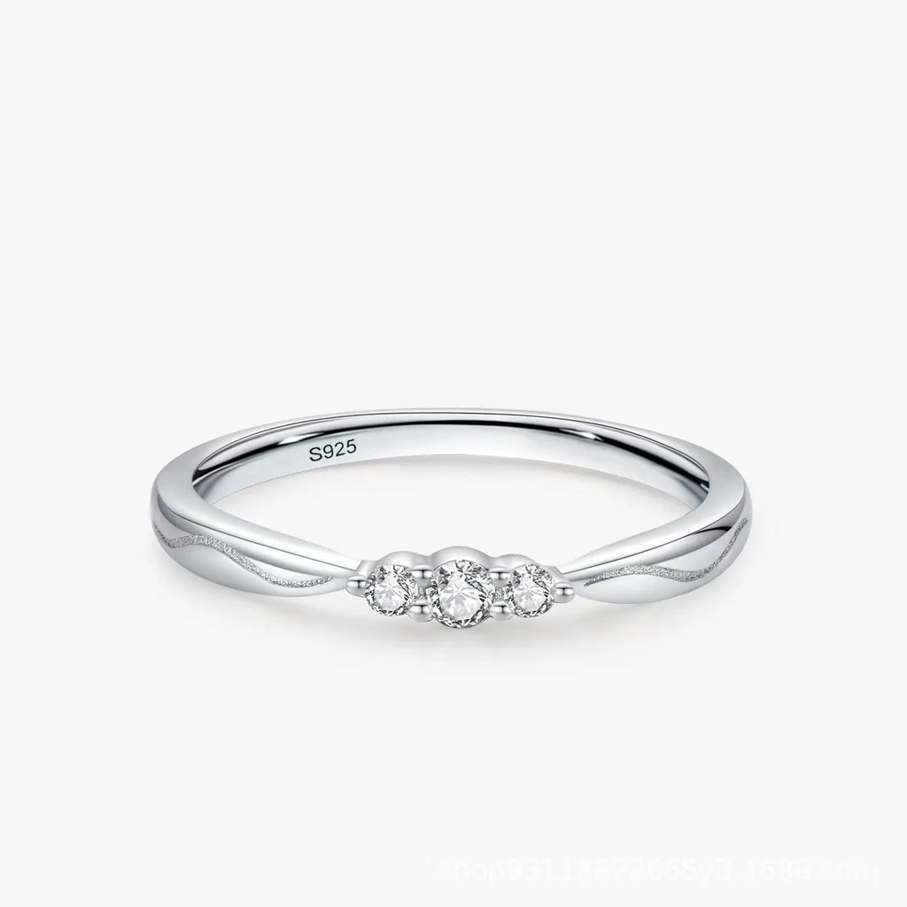 S925 sterling silver ripple wave gang drill small ring on white background, white gold colour texture