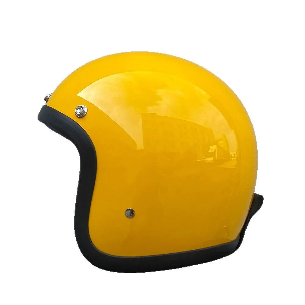 Retro-style motorcycle half helmet in cement grey with a glossy fibreglass shell on a plain background.
