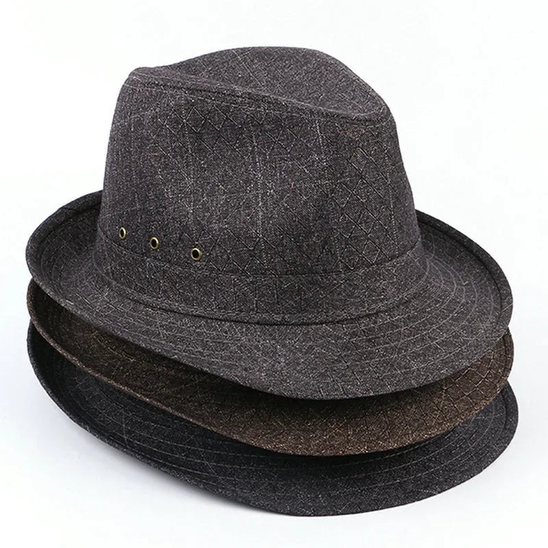Classic brown fedora hat for men on a stand, showing structured crown and brim.