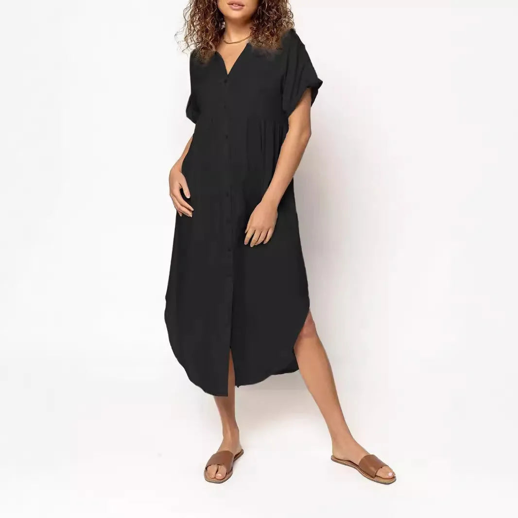Women's loose fit casual dress with button front and mid-length skirt in solid colour.