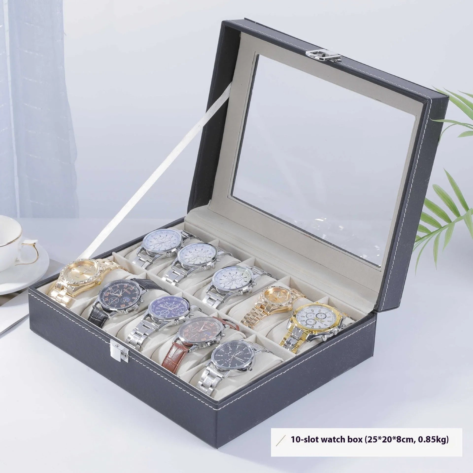 Grey leather watch storage box with a transparent dust cover, showing internal watch slots.