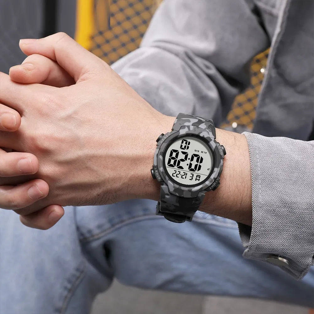 Multi-functional waterproof sports electronic watch with plastic band and stainless steel buckle on wrist
