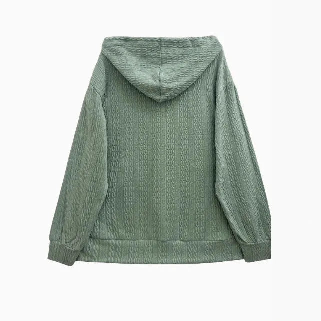 Green women's loose-fit hooded zip coat with front zipper, long sleeves, and a casual style.
