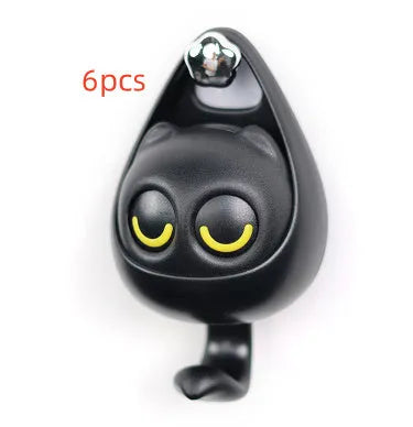 Cream white cat-shaped adhesive wall hook with winking eyes, 2.5kg capacity, 105x61x45mm