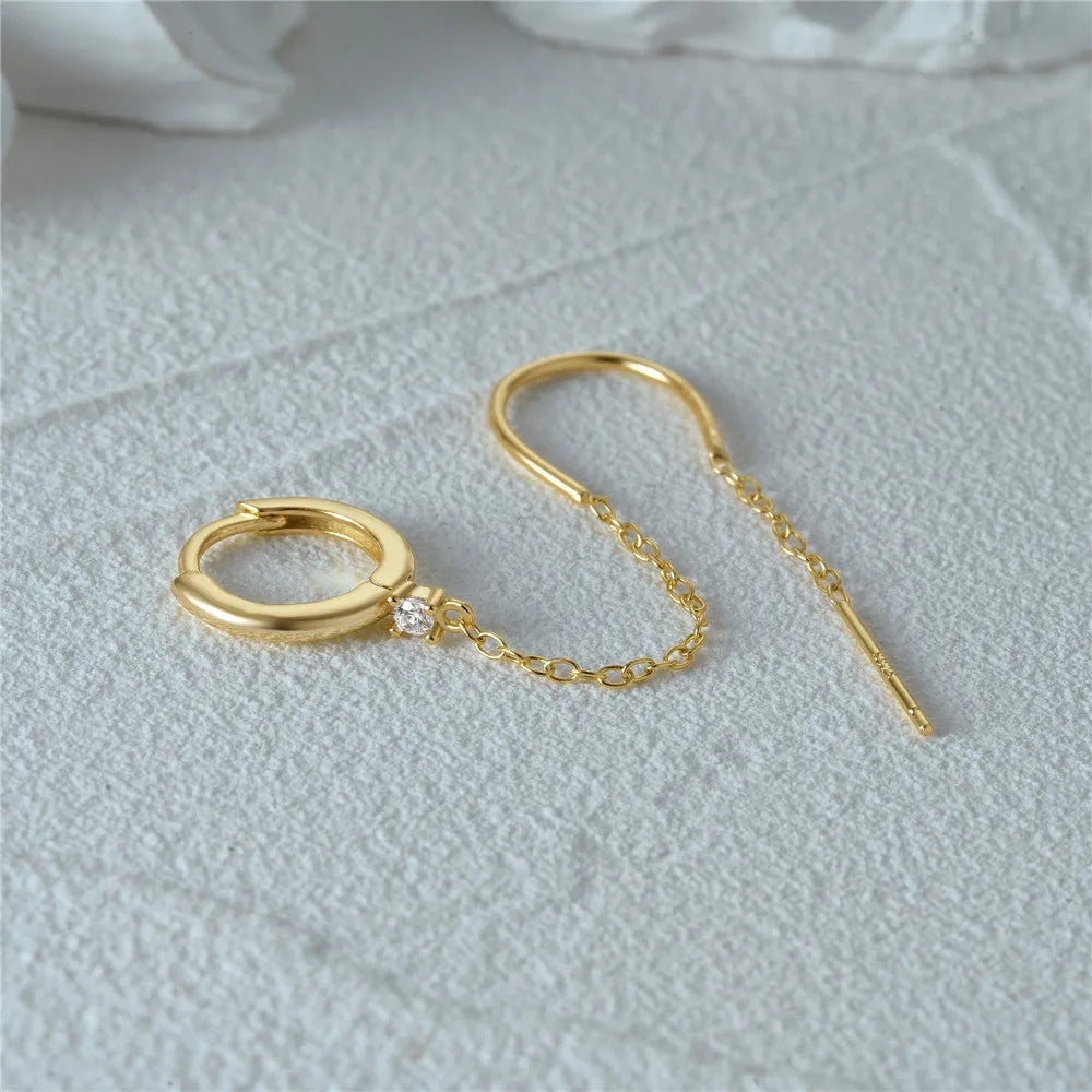 S925 sterling silver stud earrings with a diamond flower and tassel chain design in an electroplated gold finish.
