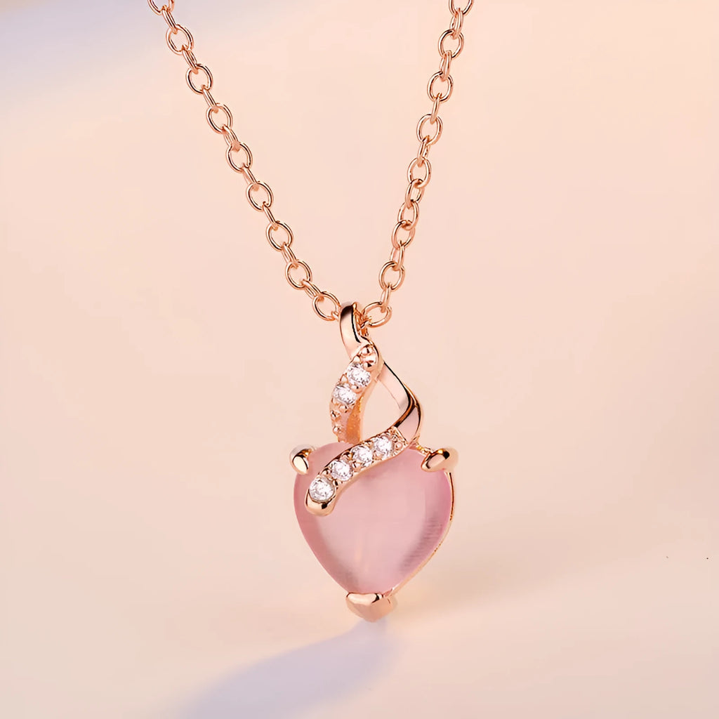 Women's heart-shaped pink artificial crystal pendant necklace on rose gold cross chain