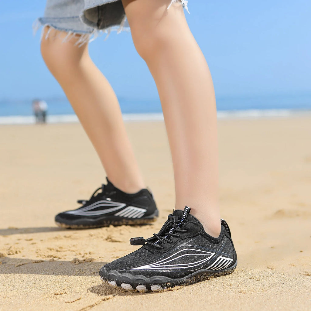 Children's quick-dry wading swimming shoes in grey with a non-slip rubber sole and elastic band.