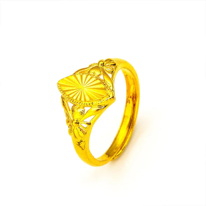 Women's electroplated brass ring with open diamond flower design and geometric texture in gold colour