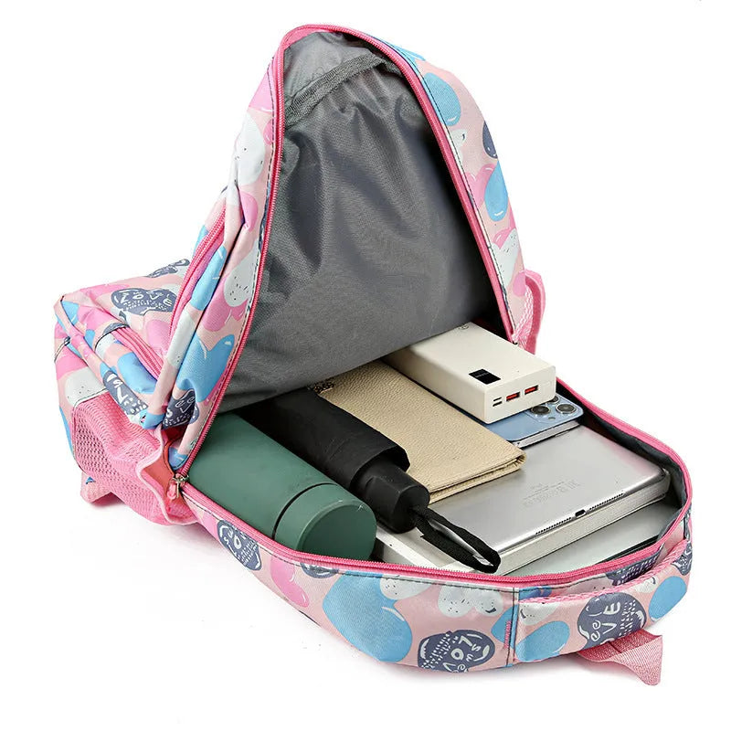 Blue children's school backpack with air pillow straps and large main compartment.