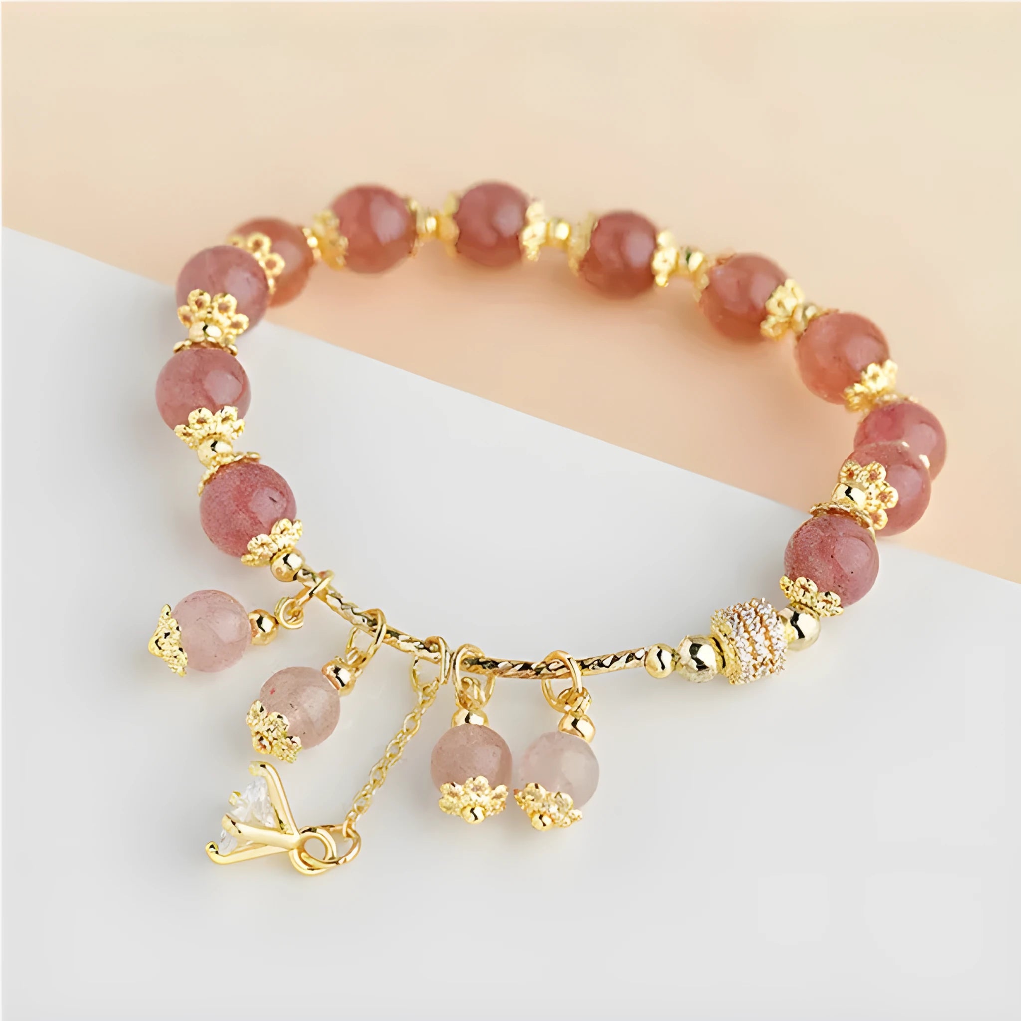 Pink strawberry quartz crystal women's bracelet with heart-shaped charm and pearl accents