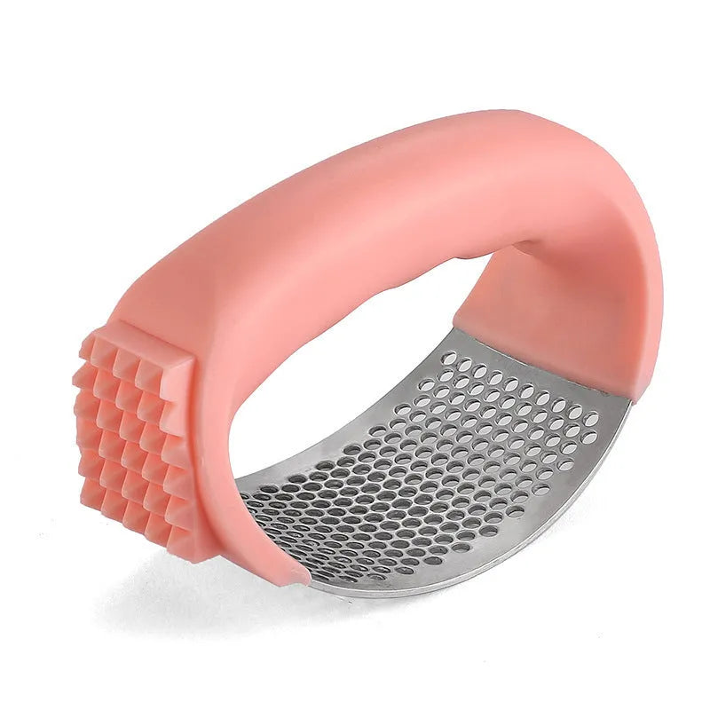 Stainless steel garlic press with polypropylene handles in modern design