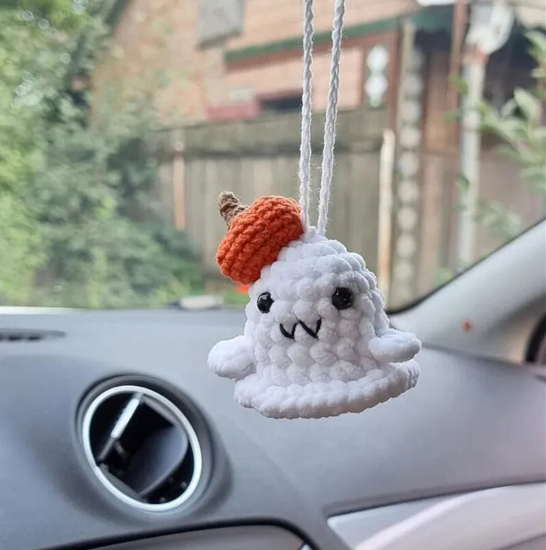 Plush hand-woven car hanging ornament in a cartoon design, made from soft polyester fabric.