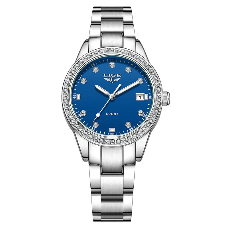 Silver Fashion Girl watch with round diamond-encrusted dial on stainless steel strap, showing luminous hands.