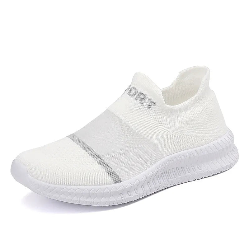 A pair of khaki Flyknit sock shoes with lace closure and a low-top design on an MD sole.