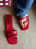Leather outdoor slippers with rubber soles in black, white, red, and silver colours with square head design