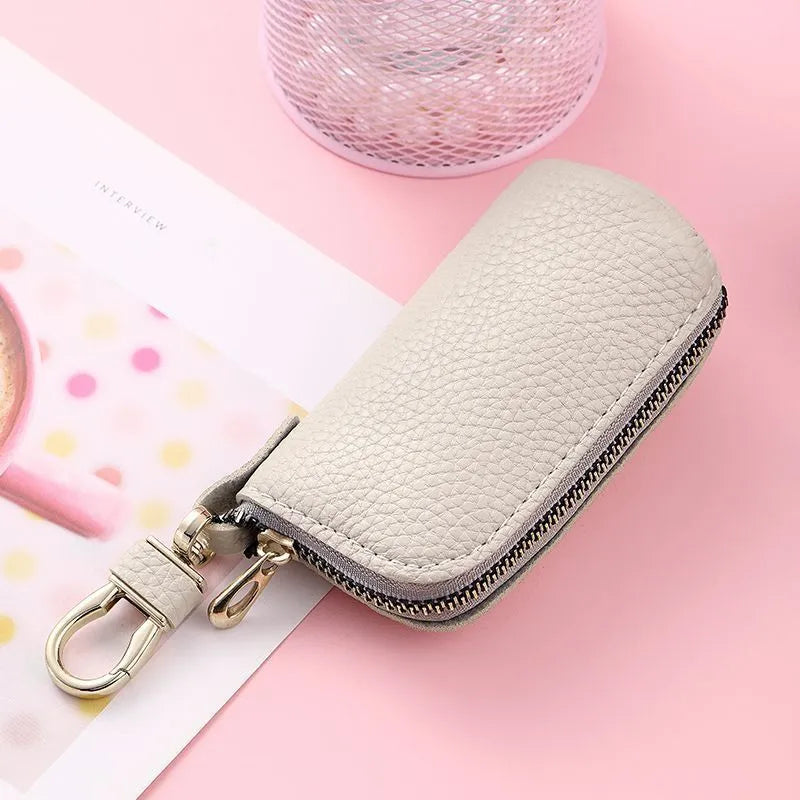 Waterproof PU leather key case in black, grey or pink with zippered expansion compartment