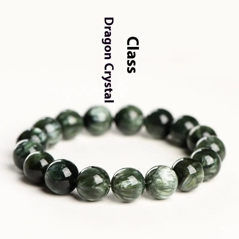 Grade 7A Green Dragon Crystal bracelet with round beads and ruyi design on a wrist.