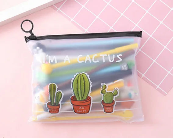 Set of twenty black 0.5mm cartoon cactus pens next to a white plastic pen case.